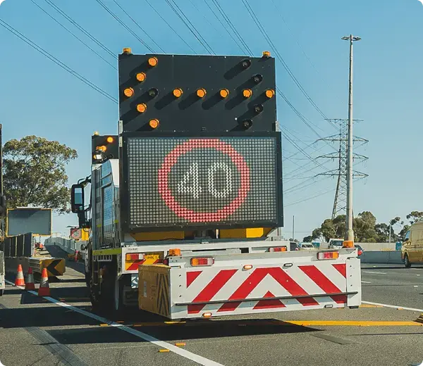 Traffic management vehicle displaying 40 km/h speed limit at West Gate Tunnel Project site
